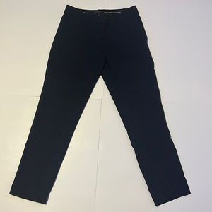 Petit fitting suit pants. Pockets on both from and back.